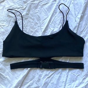 Black festival crop top with buckle waist detail